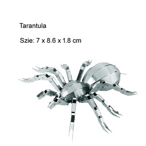 May include: A silver metal model of a tarantula spider. The model is 7 cm long, 8.6 cm wide, and 1.8 cm tall. The model is made of metal and has a realistic design.