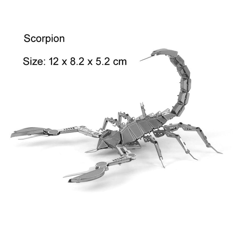May include: A silver metal model of a scorpion, assembled from individual pieces. The scorpion is posed with its tail raised and its claws extended. The model is 12 x 8.2 x 5.2 cm in size.