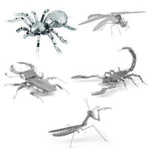 May include: Five metal insect models, including a spider, dragonfly, stag beetle, scorpion, and praying mantis. The models are all silver in colour and are posed in a variety of positions.
