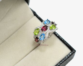 天然スイスブルートパーズ、ペリドット、ロードライトガーネットの