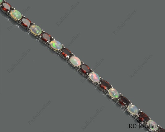 Sterling Silver Ethiopian Opal & Garnet Bracelet Sterling Silver Ethiopian Opal & Garnet Bracelet