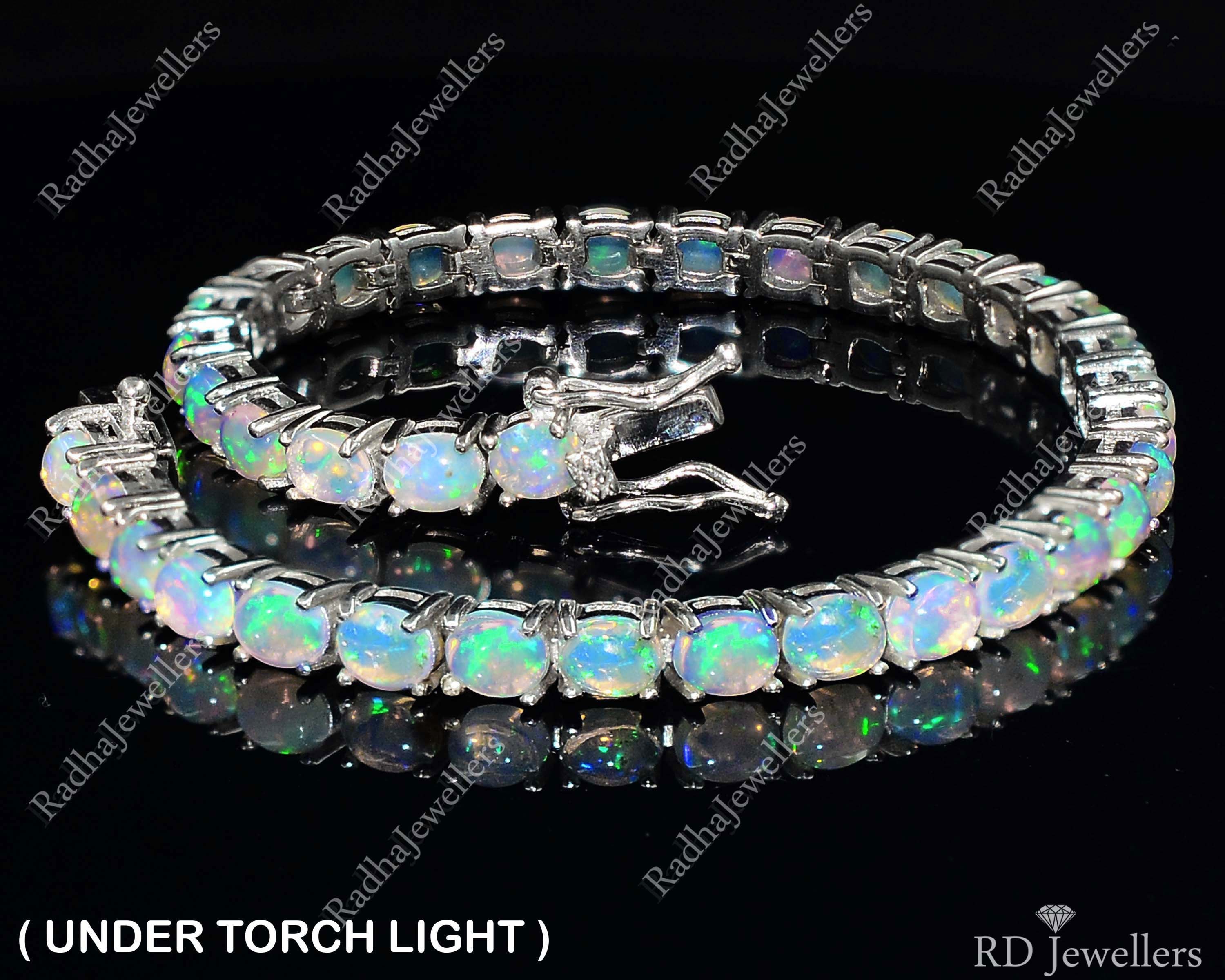 Fire opal tennis best sale bracelet