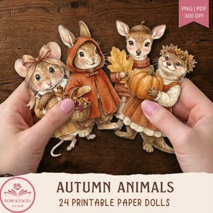 May include: A set of 24 printable paper dolls featuring watercolor illustrations of autumn animals including a mouse with a bow, a rabbit in a hooded cloak, a deer holding a leaf, and an otter with a pumpkin. Text includes PNG PDF 300 DPI and AUTUMN ANIMALS 24 PRINTABLE PAPER DOLLS.