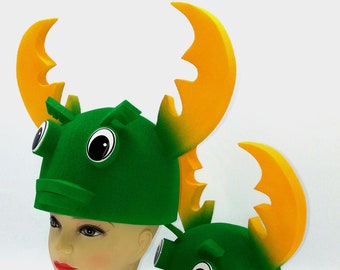 Fantastic green beetle hat. For a party and photo shoot. For Halloween and animated shows. An interesting hat for children and adults.
