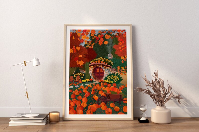 May include: A stone cottage with a round door surrounded by autumn foliage and a field of pumpkins. The cottage has a red door and a stone chimney. The pumpkins are orange and scattered across the ground.