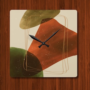 May include: A set of three ceramic mugs with a speckled, matte finish. The mugs are in shades of cream, light gray, and dark gray. Each mug has a simple, minimalist design, perfect for coffee or tea.