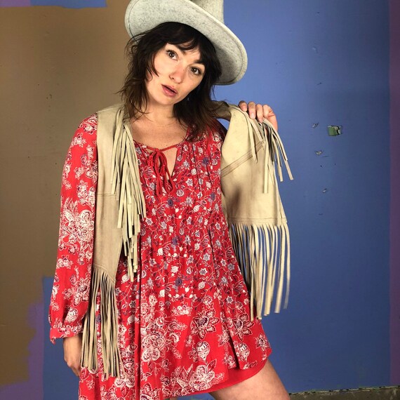 Vintage 1960s / 1970s leather fringe vest. Fits a