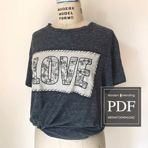 May include: A grey t-shirt with a white patch that says "LOVE" in black outlined letters filled with floral designs. The text "Modern Mending PDF INSTANT DOWNLOAD" is in the bottom right corner.