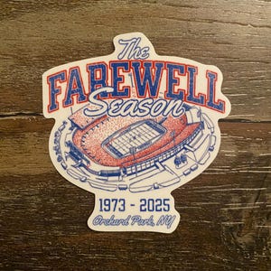May include: A white sticker featuring a blue and red stadium design. The text reads "The Farewell Season" above the stadium illustration. Below, it states "1973-2025 Orchard Park, NY".