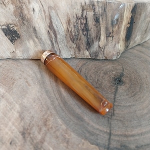 Vintage french amber cigarette holder, with gold tip, cigarette collectables