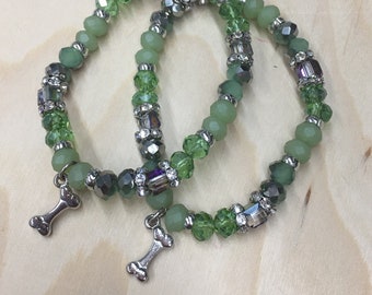 Charming Bracelet w/ Light Green Glass Beads, Sterling Silver Spacers, an a Cute Pewter Doggie Bone Charm.