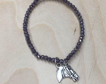 Charming bracelet w/ Purple Glass Beads,  and a horse Charm.