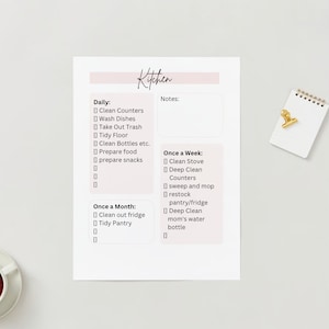 May include: A printable kitchen cleaning checklist with sections for daily, weekly, and monthly tasks. The checklist includes tasks like cleaning counters, washing dishes, taking out the trash, tidying the floor, cleaning bottles, preparing food, and preparing snacks.