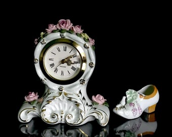 Vintage Mercedes table clock German porcelain with flowers in reliefs.