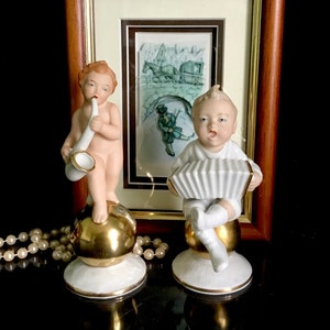 German porcelain Gerold Bavaria antique musical cherub / boy figurine. Rare