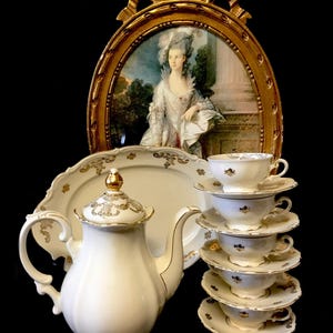 Mitterteich Bavaria porcelain antique teapot in milk porcelain with golden details. Art nouveau