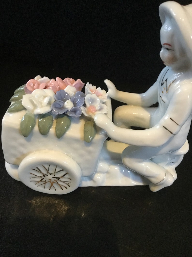 Art Deco French Figurine Porcelain U201cboy Delivering Flowers On A Bicycle U201d Rare Fine Art Ceramics Art Collectibles