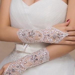 Pair of Short White Fingerless Lace Bridal Gloves With Flower Diamonte Detail