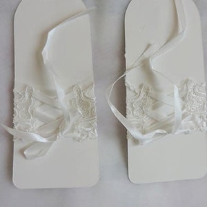 Pair of Short White Fingerless Lace Bridal Gloves With Wrist Bow & Diamonte Detail image 4