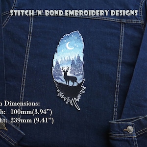 May include: A blue embroidered patch in the shape of a feather, featuring a deer silhouette in a forest scene under a starry sky. The patch is 10 cm wide and 23.9 cm high. The text "STITCH N' BOND EMBROIDERY DESIGNS" is at the top.