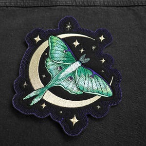 Cosmic Luna Motte Bügelbild zum aufnähen