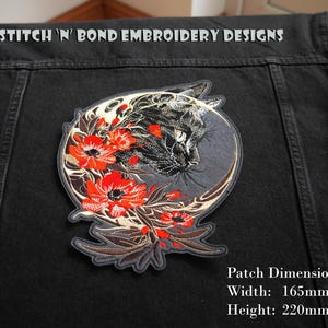 May include: Black cat embroidery patch with red flowers and gold accents. The patch is 165mm wide and 220mm tall.  "Stitch 'N' Bond Embroidery Designs" is printed at the top of the image.