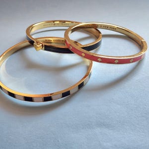 Kate Spade Black and Gold Bow Bangles a bundle of three Kate Spade Skinny Mini Bow Bangle Bracelet, Black main image 2