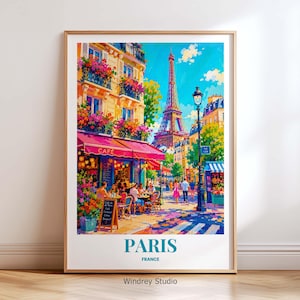 May include: A framed art print of a Parisian street scene. The image features a cafe with a red awning, people dining, and the Eiffel Tower in the background. The print has the word "PARIS" and "FRANCE" at the bottom.