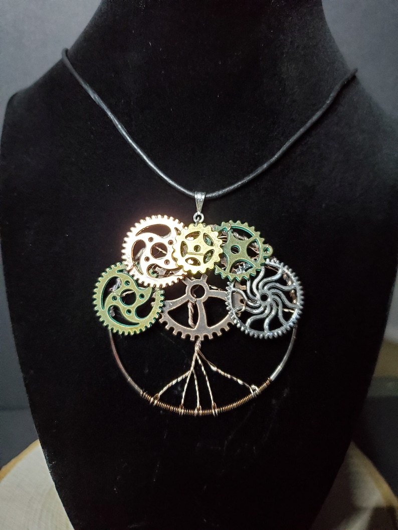 Pendant makes for a great statement piece pendant with cord style necklace Steampunk inspired tree of life handmade