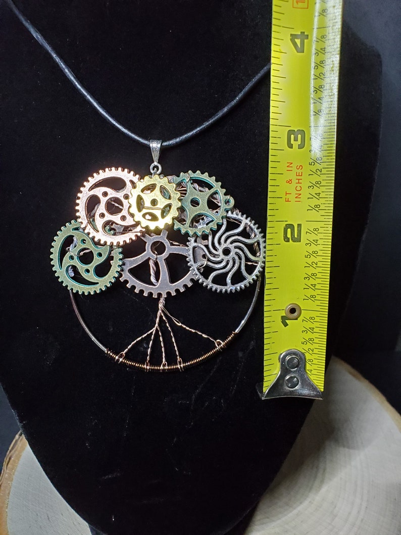 Pendant makes for a great statement piece pendant with cord style necklace Steampunk inspired tree of life handmade