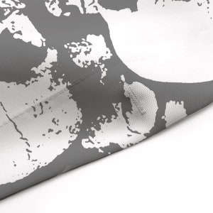 May include: Grey and white abstract pattern fabric with a textured surface.
