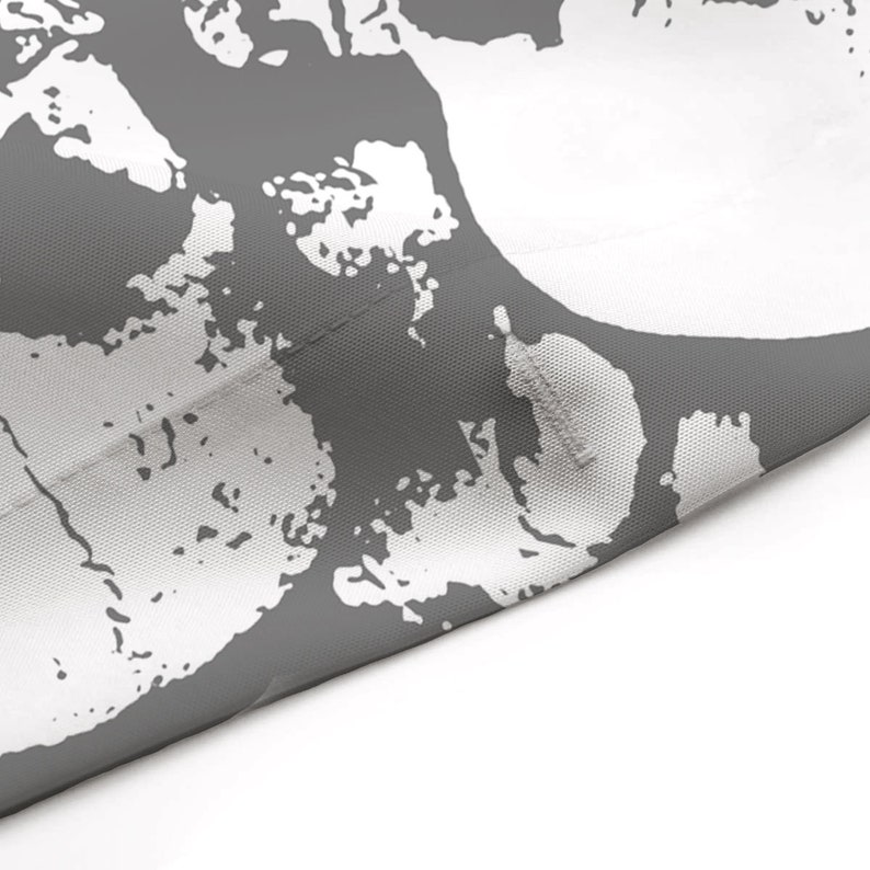 May include: Grey and white abstract pattern fabric with a textured surface.