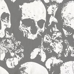 May include: A grey and white fabric with a repeating pattern of skulls and floral designs. The skulls are stylised and have a grunge aesthetic.