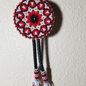Beautiful  beaded  bolo tie beaded by Thomas Harvey an enrolled member of the Ft. Peck tribe from Montana