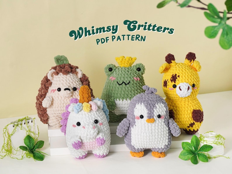 May include: A collection of five crocheted stuffed animals: a hedgehog, frog, unicorn, penguin, and giraffe. The toys are in various colors, including white, brown, green, yellow, and purple. The text "Whimsy Critters PDF Pattern" is at the top.