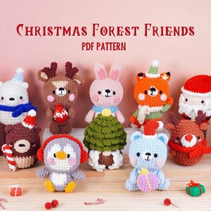 May include: A collection of handmade crochet Christmas ornaments featuring various forest animals, including a bear, deer, fox, rabbit, penguin, and Santa Claus. The ornaments are in festive colors and are displayed on a wooden surface. Text reads "Christmas Forest Friends PDF Pattern."