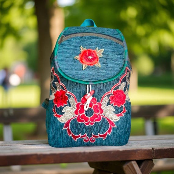 Chic Patterned Backpack in Teal Amazon.com: ALAZA Turquoise Teal Blue Flower Mini Backpack  main image 3