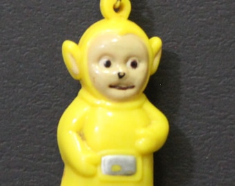 1990s TELETUBBIES LAA-LAA Schlüsselanhänger - Hartplastik - 6 x 2.5 cm. (6 cm x 2,5 cm B B C.)