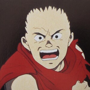 May include: A close-up of a cartoon character with a red shirt and a determined expression. The character has a pale complexion and short, spiky hair. The character's mouth is open in a shout, and their eyes are wide with anger.