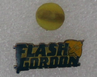 1980s FLASH GORDON Logo Lapel Pin 1" x 0.5" (2.5 x 1.25 cm.) Original Vintage Import - Extremely Hard To Find