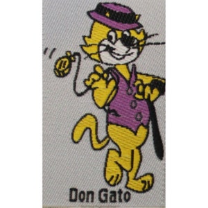 Naklejka haftowana TOP CAT z lat 80. XX w., Hiszpania, promocja, 2,2" x 1,5" (6 x 4 cm), Hanna-Barb.