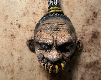 Shrunken head magnet