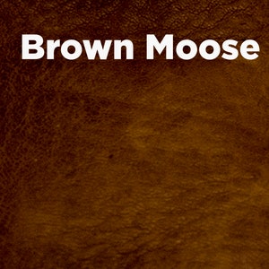 May include: Close-up of a brown leather texture with the text "Brown Moose" in white.