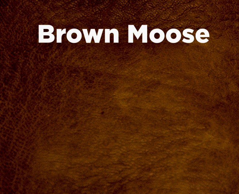 May include: Close-up of a brown leather texture with the text "Brown Moose" in white.