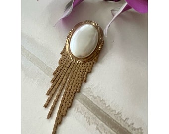 VINTAGE; Faux pearl brooch with gold tone tassel