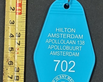 KeY Chain John Lenon Yoko Ono Bed- In AmSterdam HiLton NoVeLtY KeY Chain