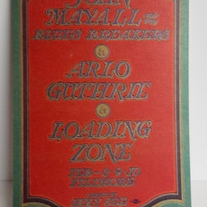 May include: A vintage concert poster with a green border and a red center. The poster advertises a concert featuring John Mayall's Bluesbreakers, Arlo Guthrie, and Loading Zone. The concert is scheduled for Friday, 9-10, at the Fillmore Auditorium, produced by Bill Graham.