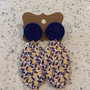 Lemon vine oval cork on leather with a royal blue stud earring