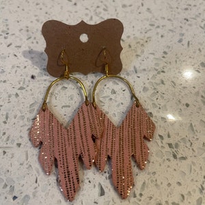 Pink suede rainy day metallic stripe feather leather hoop earrings