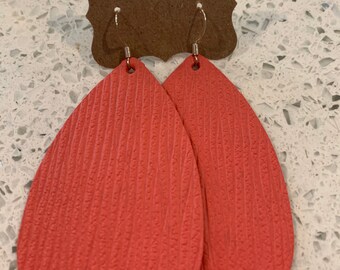 Tropical leaf living coral leather teardrop earrings